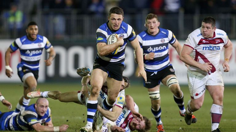 Bath's Sam Burgess is tackled by Sale's Tom Arscott