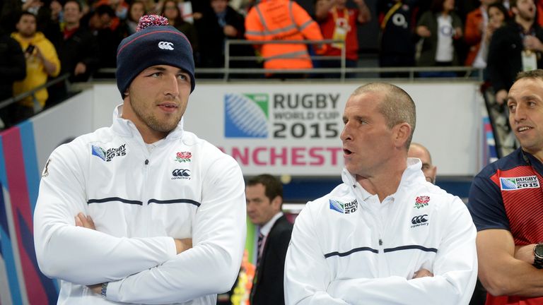 England head coach Stuart Lancaster (right) and Sam Burgess after the Rugby World Cup win over Uruguay