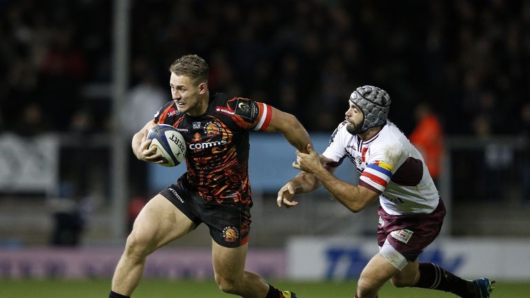 Exeter Chiefs centre Sam Hill (left) is challenged by Bordeaux-Begles centre Julien Rey