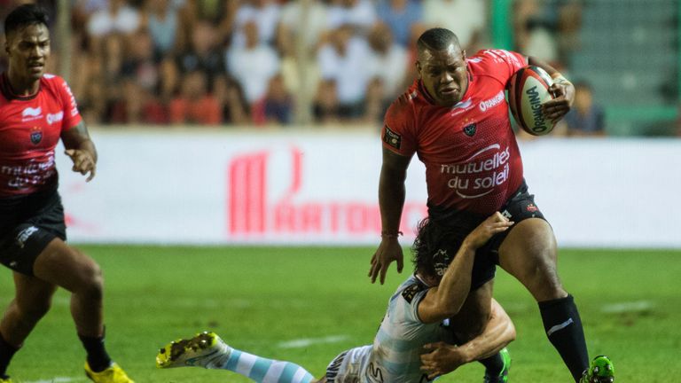 Toulon flanker Steffon Armitage is tackled by Racing 92's Henry Chavancy