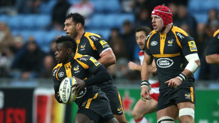 Christian Wade of Wasps breaks clear to score against  Gloucester