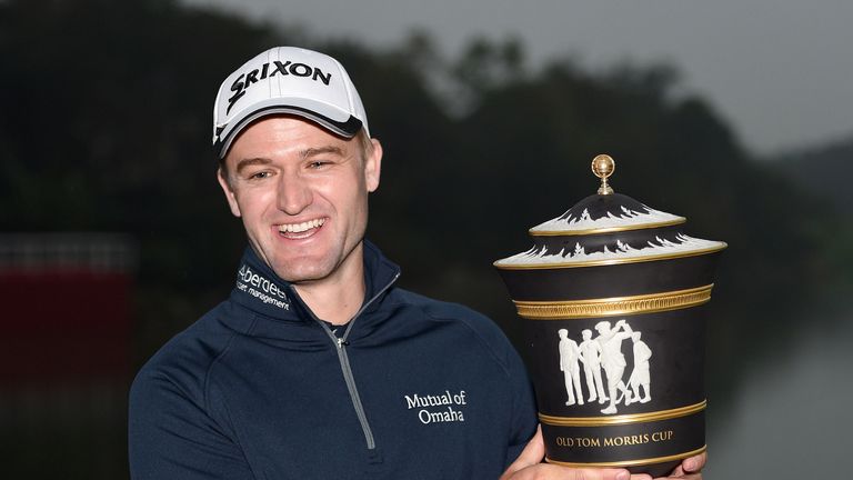 SHANGHAI, CHINA - NOVEMBER 08:  Russell Knox of Scotland with the winners trophy after the final round of the WGC - HSBC Champions at the Sheshan Internati