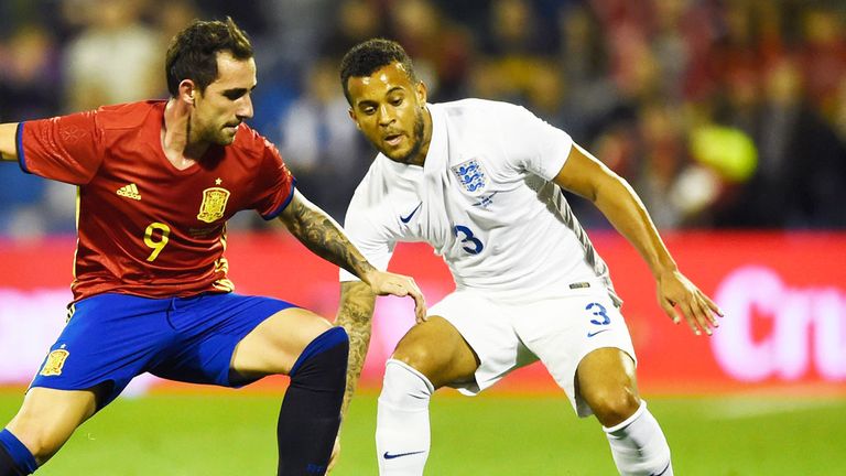 Ryan Bertrand (right) challenges Spain's Paco Alcacer Garcia