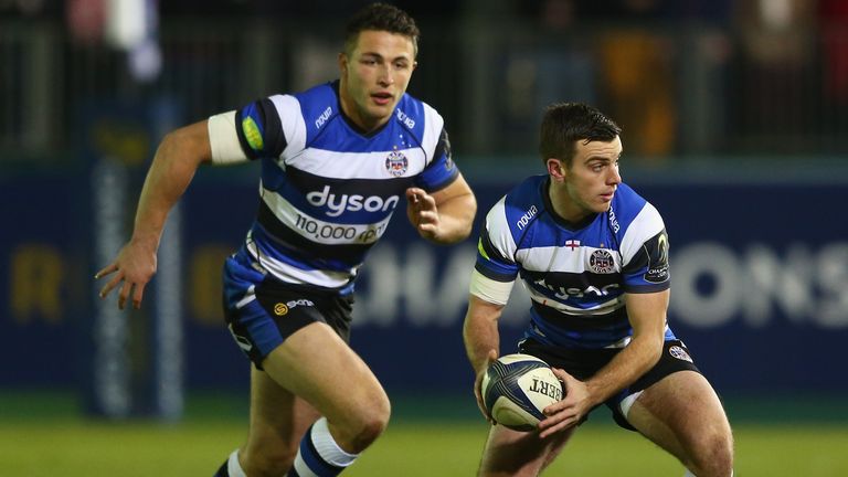 George Ford (R) of Bath looks to pass as Sam Burgess (L) looks on
