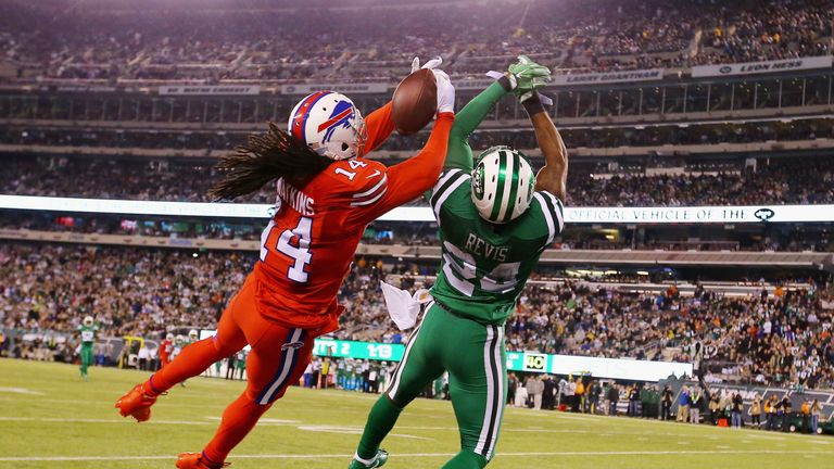 Sammy Watkins #14 of the Buffalo Bills and  Darrelle Revis #24 of the New York Jets jump for the ball in the second quarter