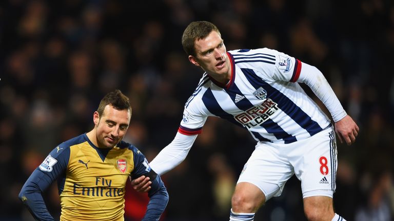 Santi Cazorla did not want to be consoled by Craig Gardner after missing the penalty