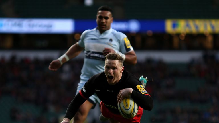 Chris Ashton of Saracens dives over to score a try during the Aviva Premiership match between Saracens and Worcester