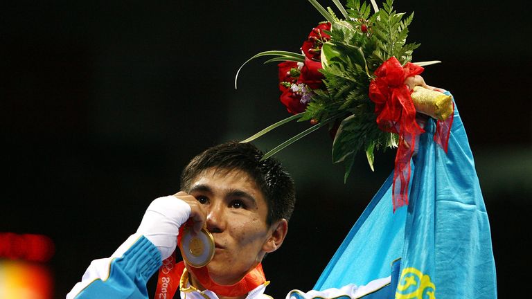 Bakhyt Sarsekbayev of Kazakhstan celebrates with the gold medal 