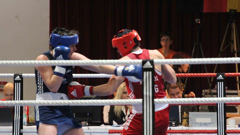 Savannah Marshall (right) battles her way to glory in Germany