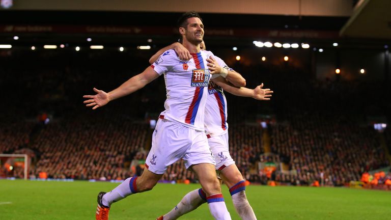 Scott Dann of Crystal Palace (L) celebrates scoring his side's second goal against Liverpool