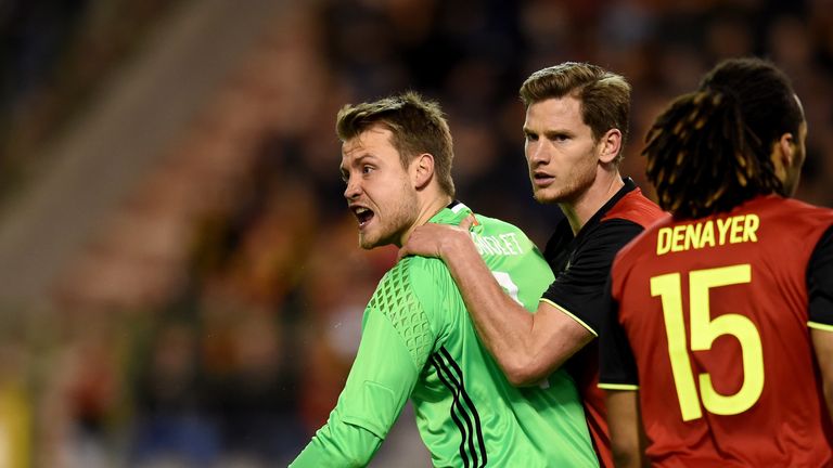 BRUSSELS, BELGIUM - NOVEMBER 13:  Simon Mignolet of Belgium (L) reacts during the international friendly match between Belgium and Italy at King Baudouin S