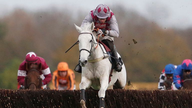 Smad Place clears the last to win the Hennessy Gold Cup by 12 lenghs