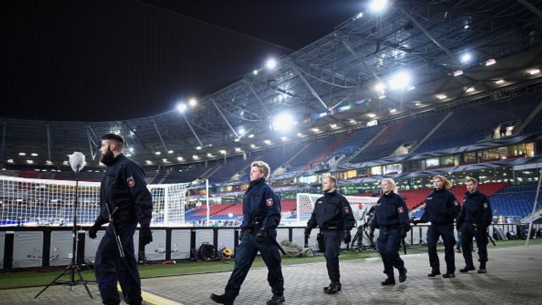 Police forces have been guarding inside and outside HDI Arena in Hannover on Tuesday