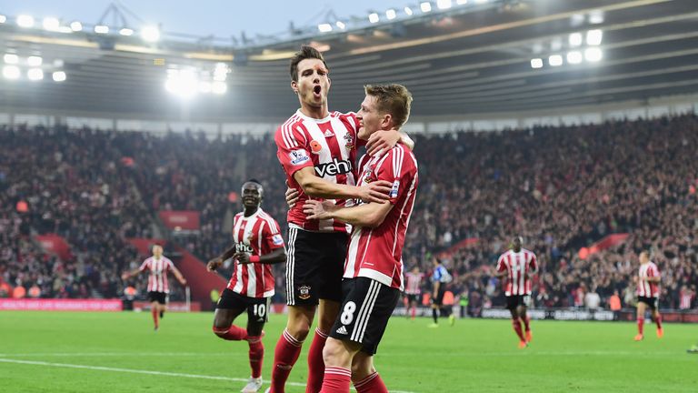 Steven Davis of Southampton celebrates with Cedric Soares 