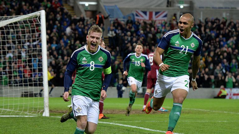 Steven Davis celebrates Northern Ireland's goal against Latvia.