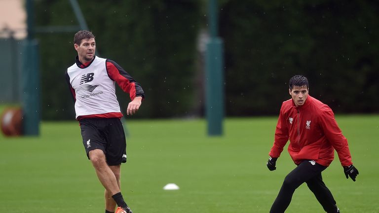 Steven Gerrard displays his passing skills in a Liverpool training session at Melwood on Monday