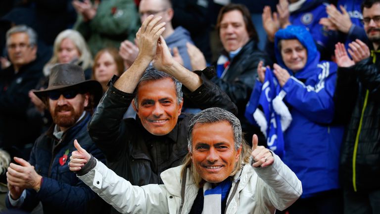 Chelsea fans wearing Jose Mourinho masks cheer prior to the Barclays Premier League match v Stoke City at the Britannia Stadium