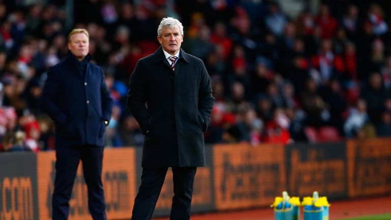 Mark Hughes, manager of Stoke City, looks on against Ronald Koeman's Southampton