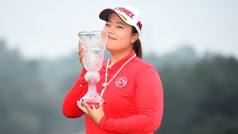Sun-Ju Ahn poses with the trophy after winning the TOTO Japan Classics 2015 at the Kintetsu Kashikojima Country Club
