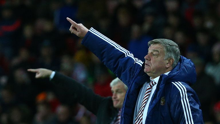 Sunderland manager Sam Allardyce (right) and Stoke boss Mark Hughes gesture from the sideline