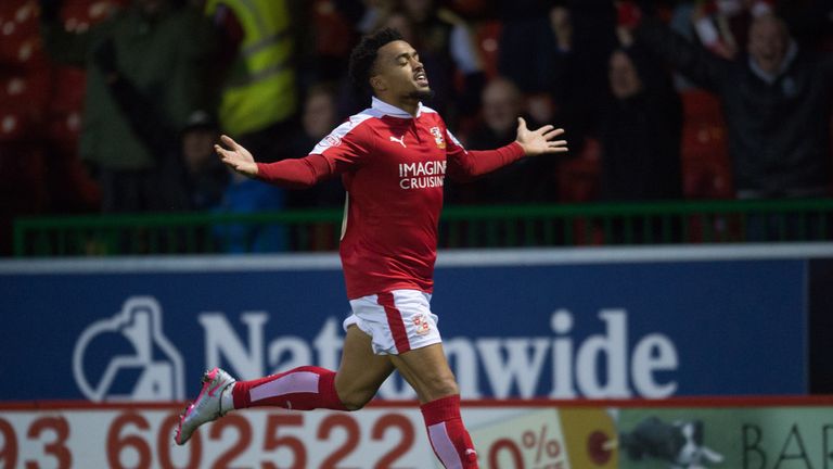 Swindon Town's Nicky Ajose celebrates scoring his side's second goal against Scunthorpe