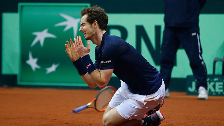 Andy Murray of Great Britain reacts after winning his match to secure the Davis Cup