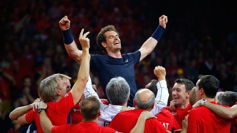 Andy Murray of Great Britain celebrates with his team-mates after winning the Davis Cup