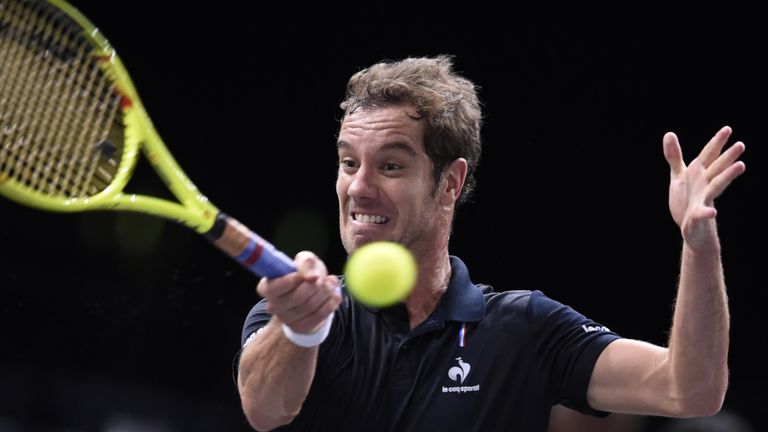 Richard Gasquet returns the ball to Andy Murray during their quarter-final at the ATP World Tour Masters in Paris