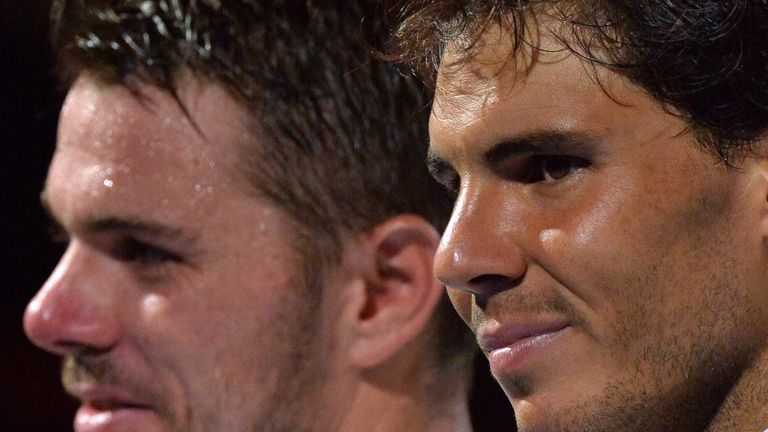 Stan Wawrinka poses with runner-up Rafael Nadal at the awards ceremony