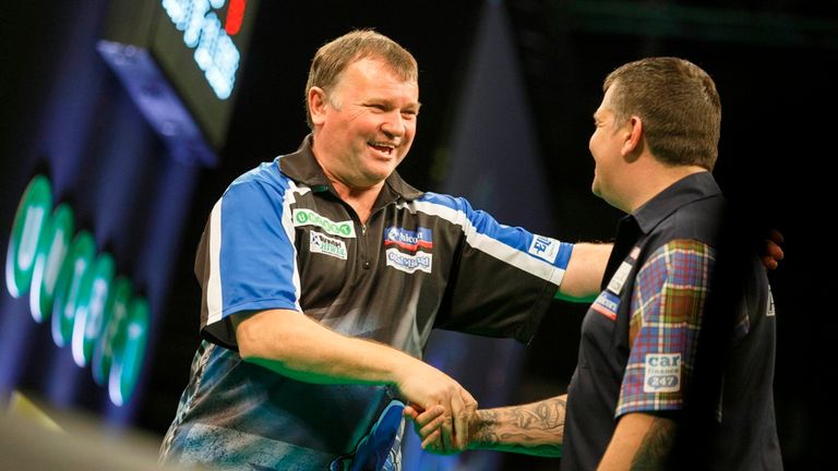 Terry Jenkins is congratulated by Gary Anderson following his World Series victory