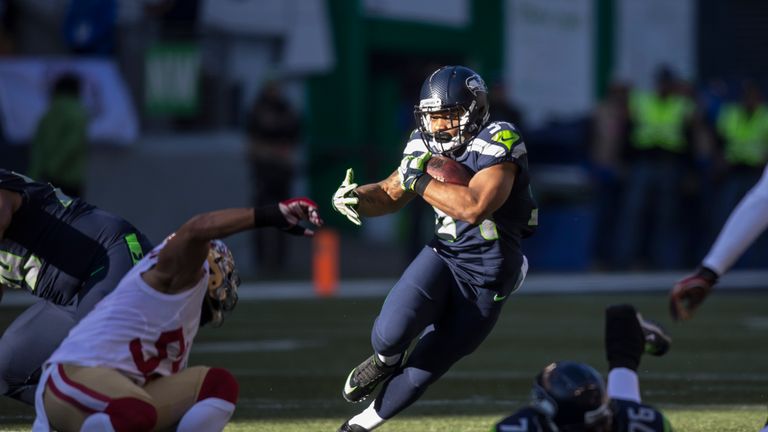 SEATTLE, WA - November 20: Running back Thomas Rawls #34 of the Seattle Seahawks runs with the ball during the first of a football game against the San Fra
