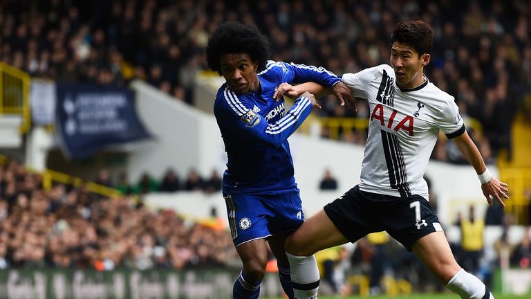 Willian of Chelsea battles with Son Heung-Min of Tottenham