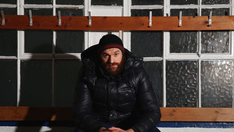 Tyson Fury poses for a photo after a Media Work Out session at the Peacock Gym in Canning Town on November 26, 2014 in Lond