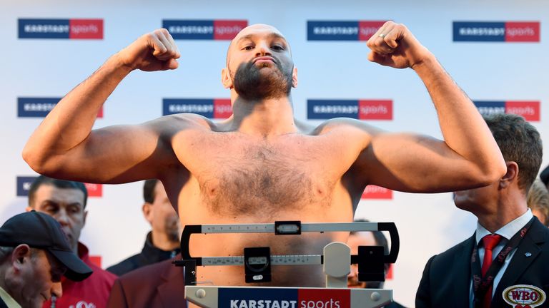 Tyson Fury of UK poses after the weigh in at Karstadt Sport on November 27, 2015 in Essen, Germany.  (Photo by Lars Baron/Bongarts/Getty Images)