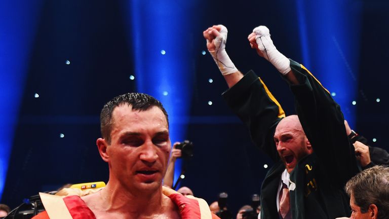 Tyson Fury celebrates after defeating Wladimir Klitschko in Dusseldorf