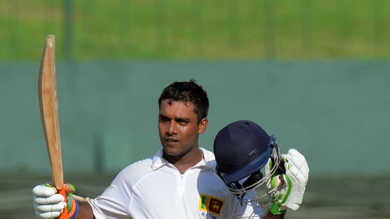 Udara Jayasundera celebrates after scoring a century for Sri Lankan President's XI against West Indies