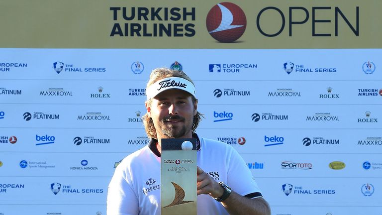 ANTALYA, TURKEY - NOVEMBER 01:  Victor Dubuisson of France poses with the trophy after victory in the Turkish Airlines Open at The Montgomerie Maxx Royal G