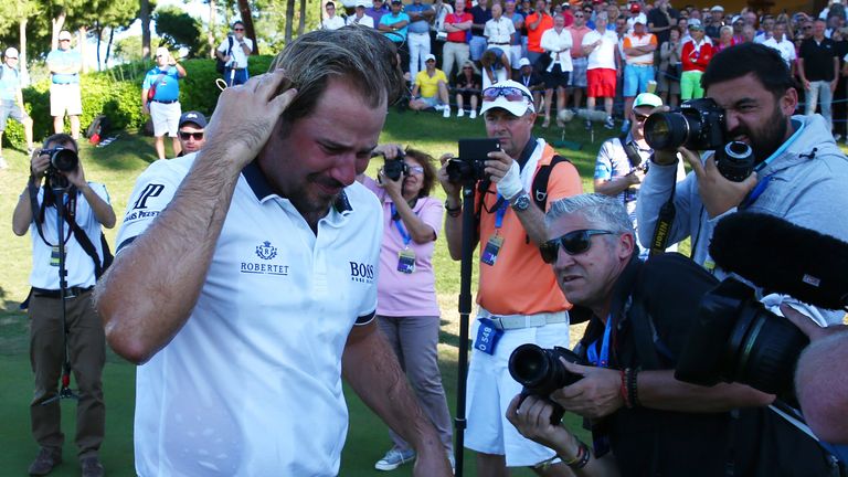 ANTALYA, TURKEY - NOVEMBER 1 : Victor Dubuisson of France winner of the 2015 Turkish Airlines Open breaks down in tears as he walks  from the 18th green du
