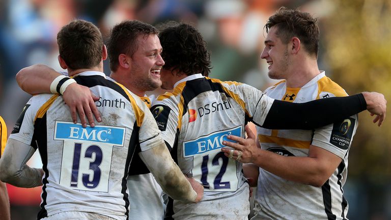 Wasps players celebrate their Champions Cup victory over Leinster