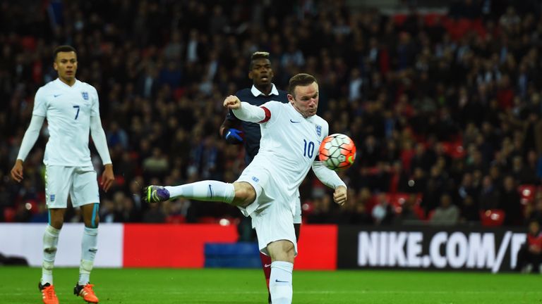Wayne Rooney of England scores his team's second goal during the International Friendly match between England and France at Wembley