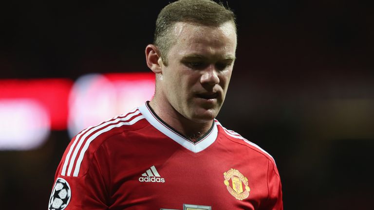Wayne Rooney walks off after the UEFA Champions League match between Manchester United and PSV Eindhoven