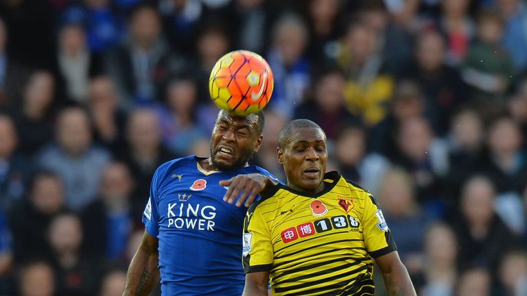 Wes Morgan of Leicester City and Odion Ighalo of Watford compete for the ball