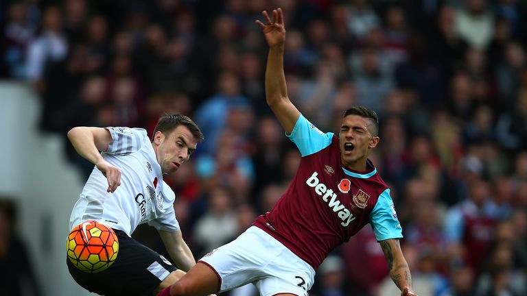 Manuel Lanzini  is brought down by Seamus Coleman