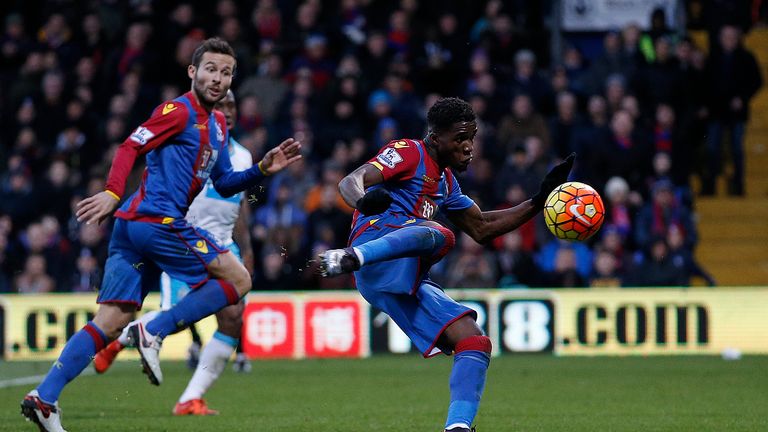 Wilfried Zaha (right) puts Palace 3-1 up before half-time