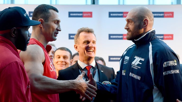 Wladimir Klitschko shakes hands with Tyson Fury a day before the big fight