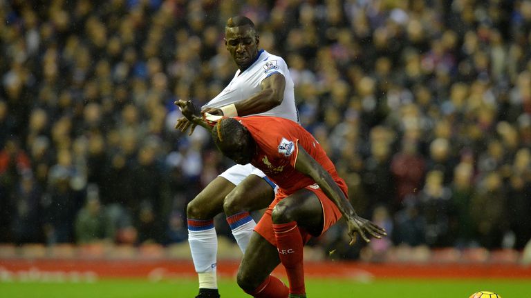 Crystal Palace's Yannick Bolasie battles for the ball with Liverpool's Mamadou Sakho