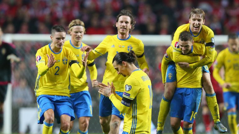 Zlatan Ibrahimovic of Sweden is mobbed by team mates