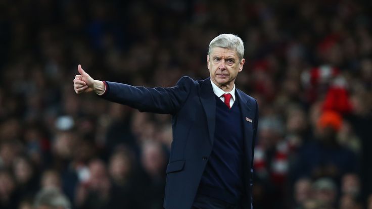 Arsene Wenger gives the thumbs up to his Arsenal team as he sees them defeat Manchester City
