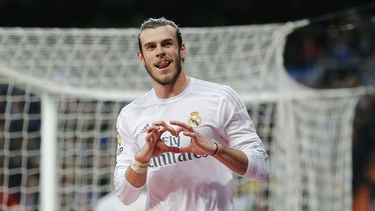 Gareth Balecelebrates after scoring his team's eighth goal during the La Liga match between Real Madrid and Rayo Vallecano at Santiago Bernabeu