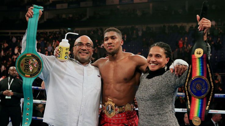 Anthony Joshua celebrates victory over Dillian Whyte during the Vacant British and Commonwealth heavyweight title bout